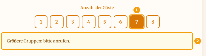 Die Zahl 7 ist angetippt (1) und der gelbe Hinweis, der unter den Zahlen erscheint (2)