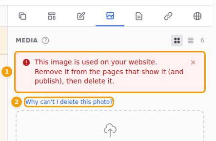 The message when a photo is still in use (1) and the link to this help (2)